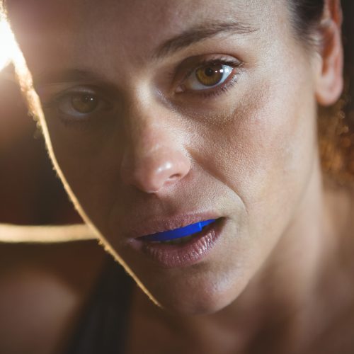 female boxer wearing mouthguard