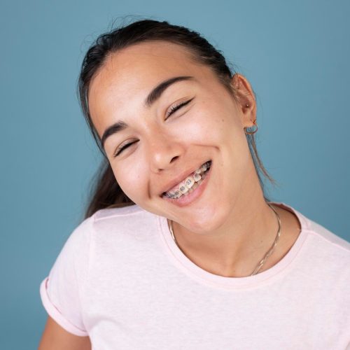 Girl with braces smiling