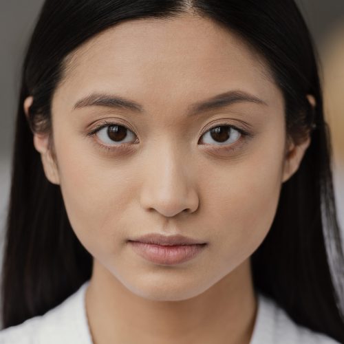 face of asian woman looking straight at camera