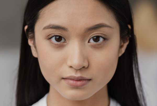 face of asian woman looking straight at camera
